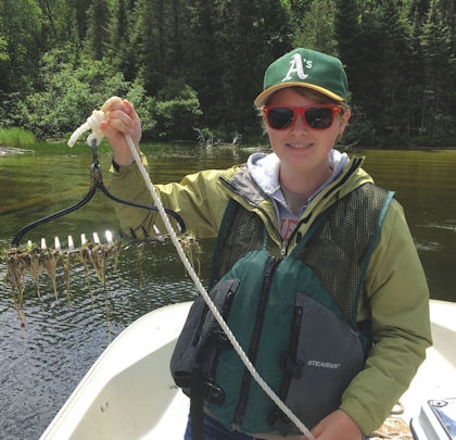 Anna Johnson collecting Itasca County water data